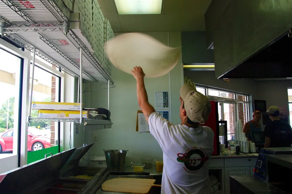 Tossing fresh dough at Lazzara's